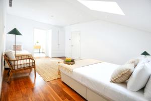 Ένα ή περισσότερα κρεβάτια σε δωμάτιο στο Zen & Tan Apartment +17 φωτογραφίες