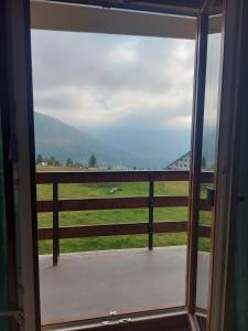 a view from a door looking out at a field at Casa a Rucas in Montoso