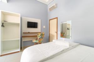 TV a/nebo společenská místnost v ubytování Imperatriz Paraty Hotel