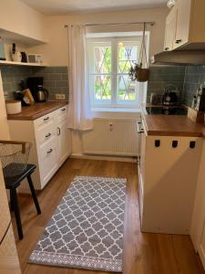 Kuchyň nebo kuchyňský kout v ubytování Ferienwohnung Gartenglück