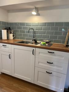Kuchyň nebo kuchyňský kout v ubytování Ferienwohnung Gartenglück
