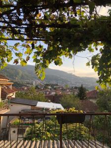 a view of a city from a balcony at Apartment Incognito in Sarajevo