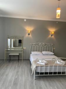 Postel nebo postele na pokoji v ubytování Argo Hotel