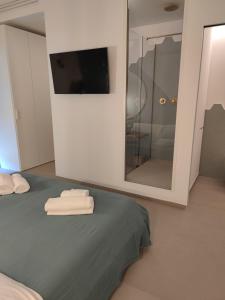 Postel nebo postele na pokoji v ubytování Sfumature D'aMare