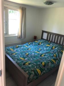 Postel nebo postele na pokoji v ubytování Landelijk chalet omgeving Veluwe