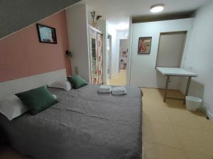 Postel nebo postele na pokoji v ubytování Hotel Au Val Doré