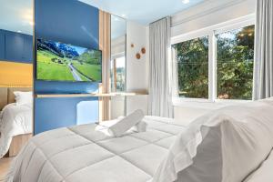 Ένα ή περισσότερα κρεβάτια σε δωμάτιο στο Apartamento Bellagio 2 Suítes e Piscina by Achei +38 φωτογραφίες