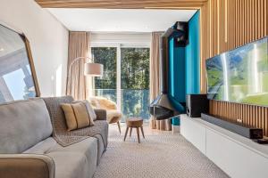 Μια τηλεόραση ή/και κέντρο ψυχαγωγίας στο Apartamento Bellagio 2 Suítes e Piscina by Achei