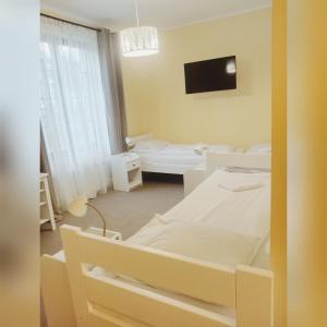 Postel nebo postele na pokoji v ubytování Motel Tower