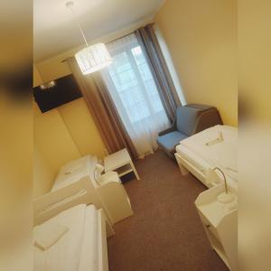 Postel nebo postele na pokoji v ubytování Motel Tower