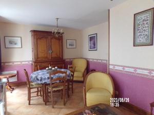 Posezení v ubytování Le Chandelier