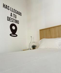 Posteľ alebo postele v izbe v ubytovaní La Fonda de la Calle Ancha
