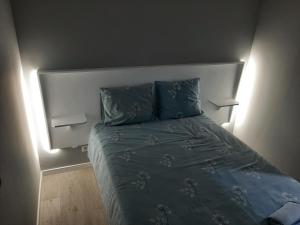 Katil atau katil-katil dalam bilik di Casa da Ilha Granjal Treixedo