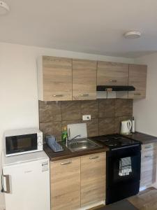 Una cocina o cocineta en STUDIO APARTMAN NADA