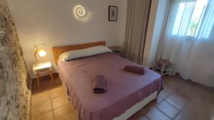 Postel nebo postele na pokoji v ubytování VALDEVAQUEROS HOUSE