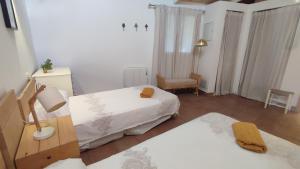 Postel nebo postele na pokoji v ubytování VALDEVAQUEROS HOUSE + 37 fotografií