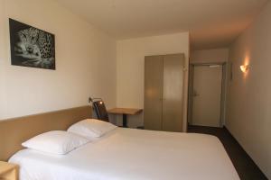 Voodi või voodid majutusasutuse St-Janshof Hotel toas