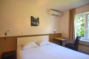 Voodi või voodid majutusasutuse St-Janshof Hotel toas