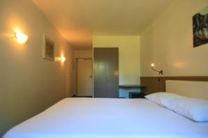 Voodi või voodid majutusasutuse St-Janshof Hotel toas