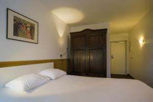 Voodi või voodid majutusasutuse St-Janshof Hotel toas