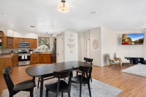 a kitchen and dining room with a table and chairs at West Sedona Retreat in Sedona
