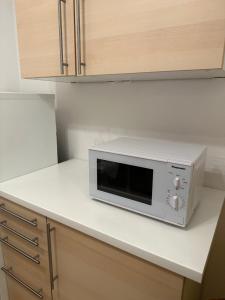 Kuchyň nebo kuchyňský kout v ubytování Advice & Advise Apartment