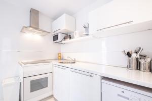 Kuchyň nebo kuchyňský kout v ubytování Carlos V 3-A Apartment Levante Beach