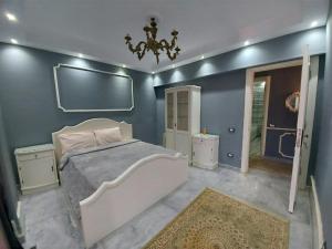 Postel nebo postele na pokoji v ubytování Zayed dunes