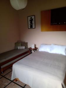 En eller flere senge i et værelse på Casa El Palto