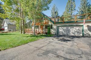 a house with a garage and a deck at 11 Mi to Ski Resorts! Lake Tahoe Gem with Pool Table in South Lake Tahoe