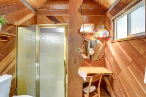 a tiny house with a mirror and a table at Rustic Lake Tahoe Cabin 2 Blocks to Truckee River in South Lake Tahoe