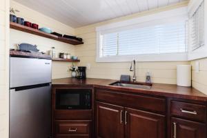 A kitchen or kitchenette at Ruby Red Tiny Home