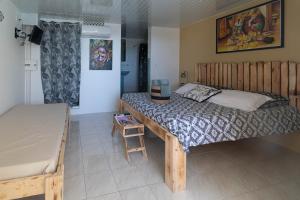 Voodi või voodid majutusasutuse Villa Sable et Colibris toas
