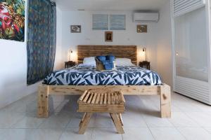 Voodi või voodid majutusasutuse Villa Sable et Colibris toas