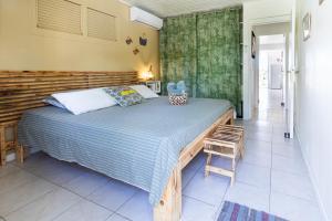Voodi või voodid majutusasutuse Villa Sable et Colibris toas