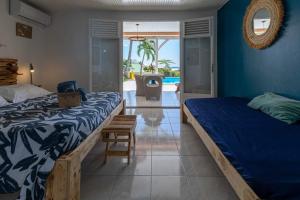 Voodi või voodid majutusasutuse Villa Sable et Colibris toas