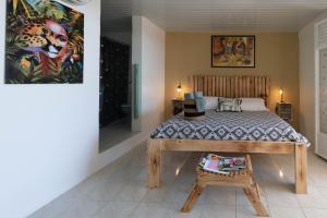 Voodi või voodid majutusasutuse Villa Sable et Colibris toas