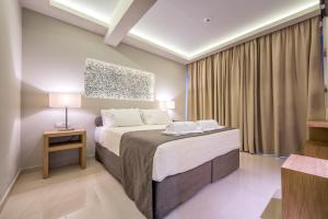 Voodi või voodid majutusasutuse Azure Resort & Spa toas