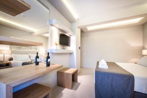 Voodi või voodid majutusasutuse Azure Resort & Spa toas