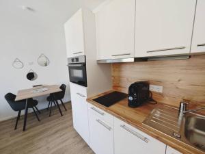 Gallery image of TiCasa PALMS Zentral-Outlet-SmartTV-Aufzug-Stylisch-Unique in Metzingen