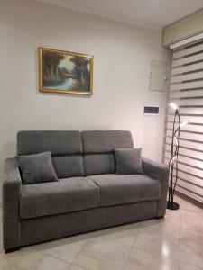 A seating area at Loft Magna Grecia Reggio Calabria Centro Storico a 3 minuti a piedi dal mare