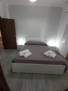 Posteľ alebo postele v izbe v ubytovaní B&B RAFFAELA