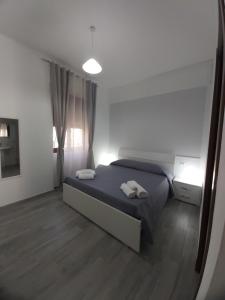 Postel nebo postele na pokoji v ubytování B&B RAFFAELA