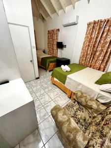 Postel nebo postele na pokoji v ubytování E.W.B. Properties