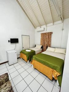 Postel nebo postele na pokoji v ubytování E.W.B. Properties
