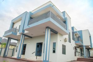 a house with blue and white at Lake Luxury Homes in Ibadan