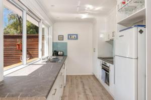 Køkken eller tekøkken på Black Wattle at Hyams Beach