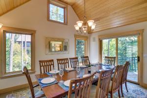 a dining room with a large wooden table and chairs at Mountain Home about 5 Mi to Winter Park Resort! in Winter Park