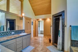 a bathroom with a shower and a sink at Mountain Home about 5 Mi to Winter Park Resort! in Winter Park +61 photos