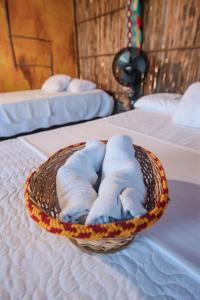 A bed or beds in a room at Rancheria Utta